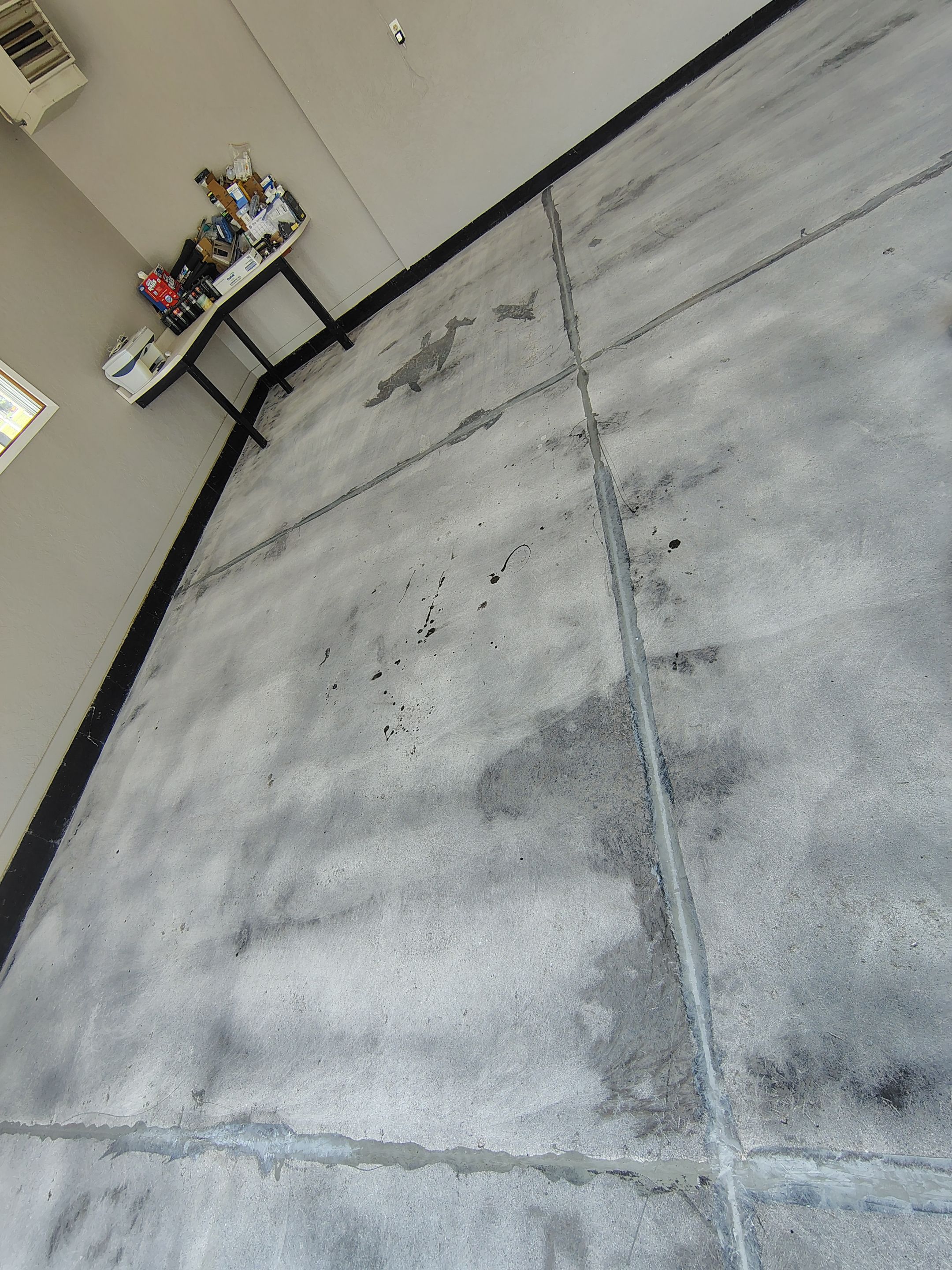 Garage Concrete Floor Coating and Crack Repair in Onawa by Select Painting, Coatings & Garage Cabinets