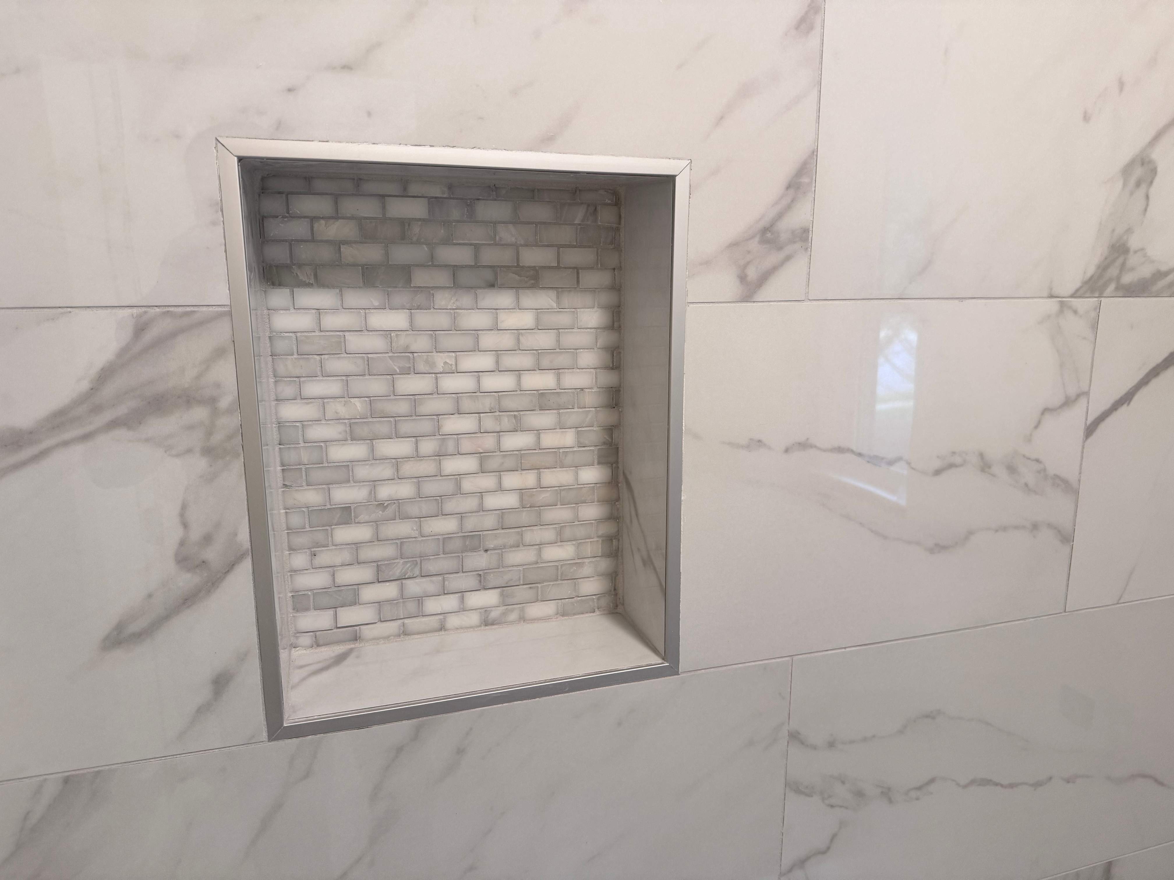 Tub and floor tile installation by Prudencio