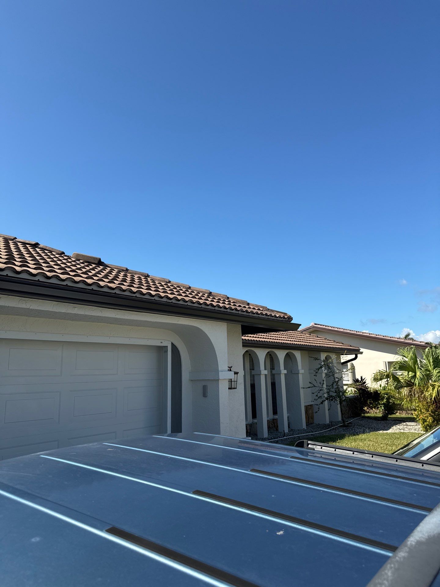 Black Seamless Gutters for Modern Homes in Punta Gorda by Gutter Professors