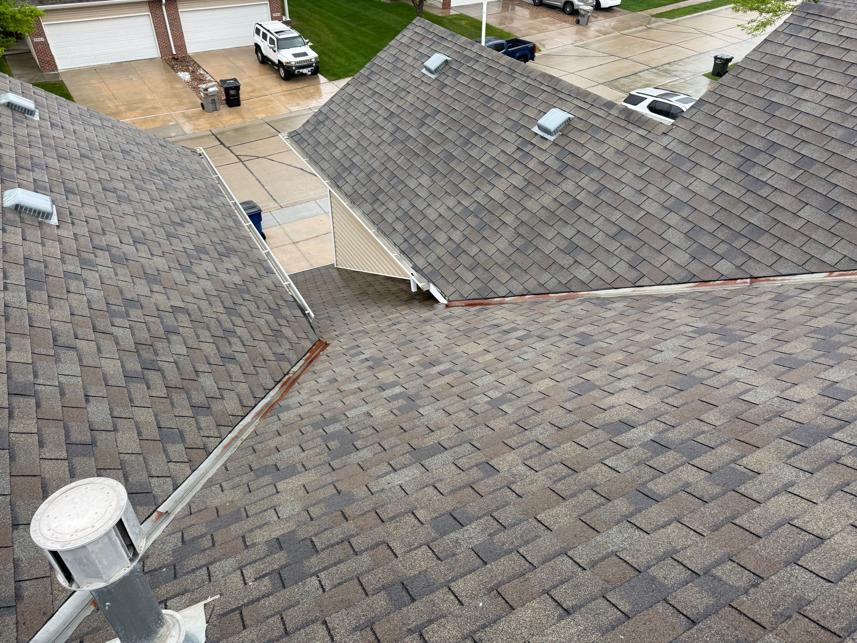 Residential Architectural Shingle Roof Replacement and Gutter Upgrade in Lincoln by Star Home