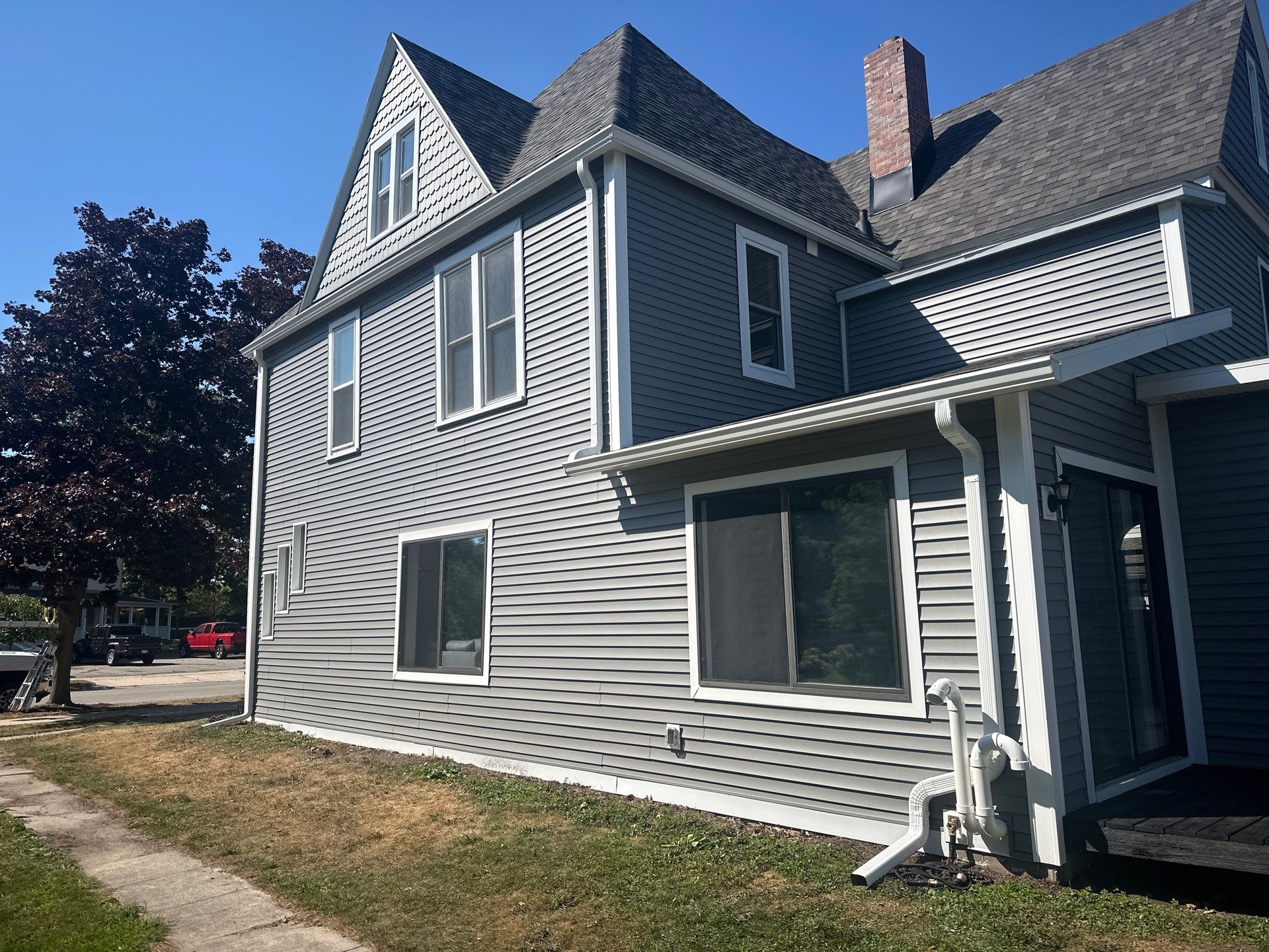 Complete Gutter and Downspout Installation in Charlevoix by Rainbow Seamless Systems