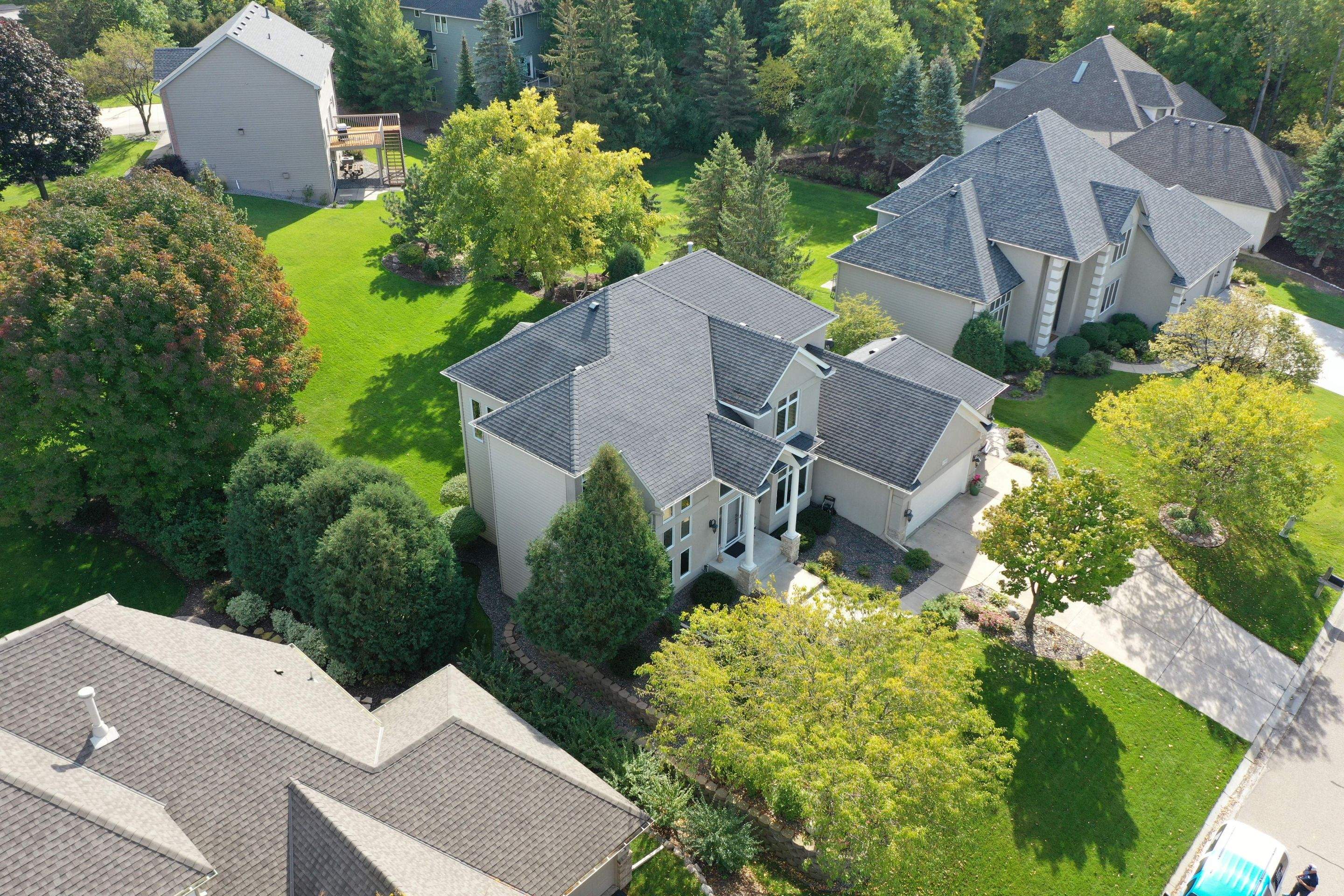 Residential Roofing Installation using Certainteed Landmark Moire Black by MODERN EXTERIOR SYSTEMS