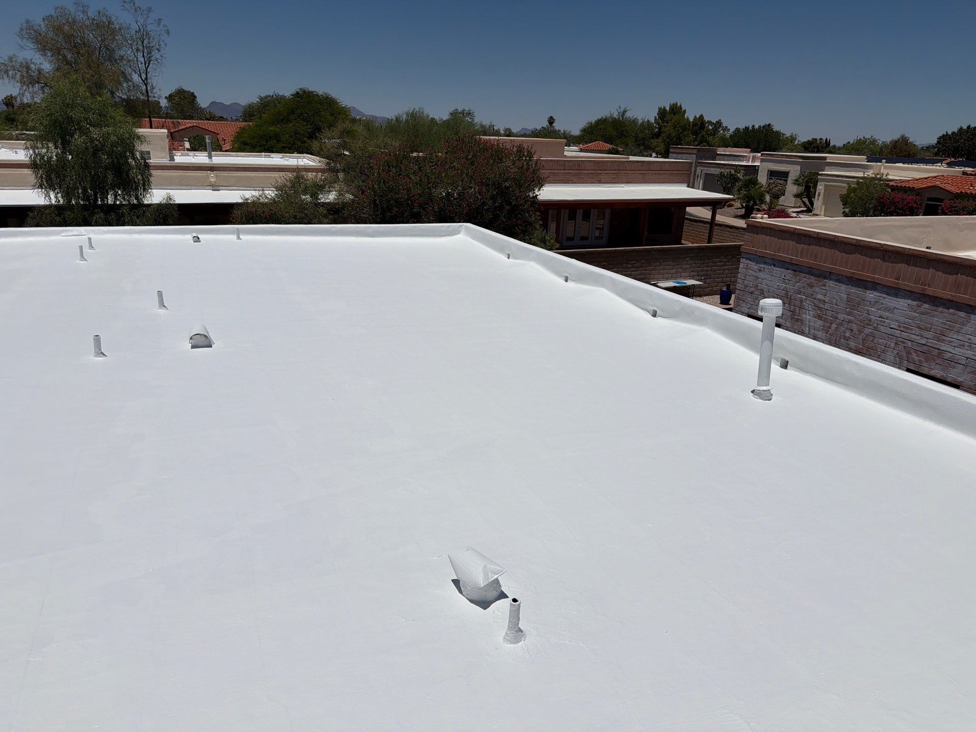 Tucson Residential Roof Restoration with Tile and Elastomeric Coating by West Coast Roofing AZ