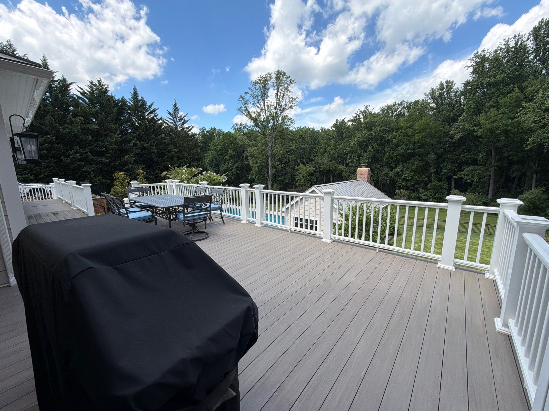 Composite Deck and Stone Paver Walkway power washing. by Baltimore Pressure Washers Inc.