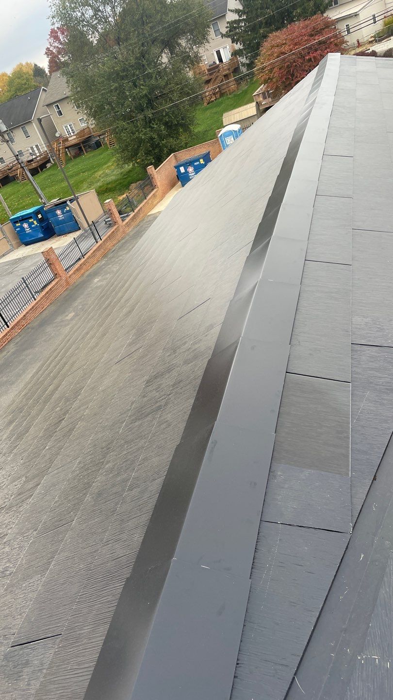 Tesla Solar Roof on a Commercial Building by American Home Contractors