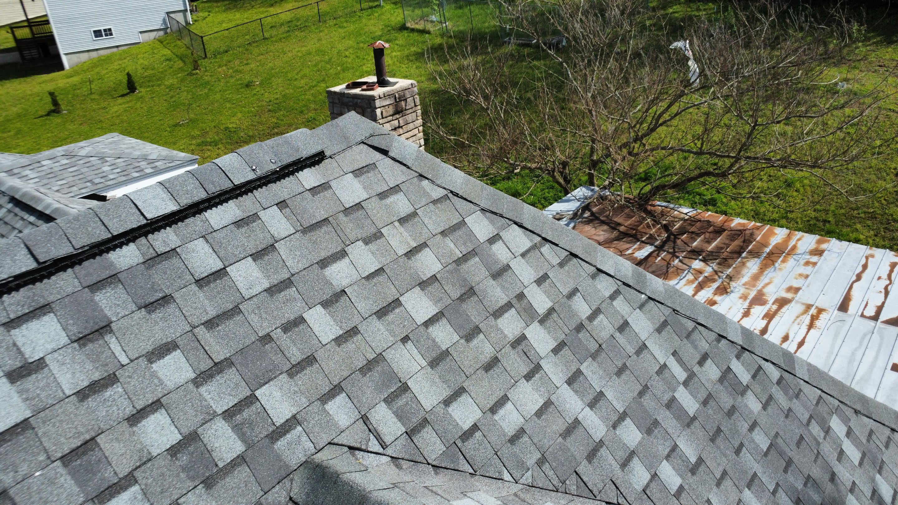 Residential Roof + Gutters & Downspouts Install  by Titan Commercial & Residential Roofing 