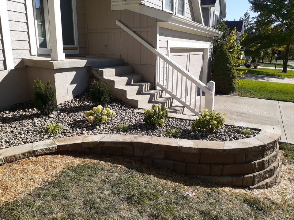 Front Yard Elevated landscape by LAND ESCAPES LLC