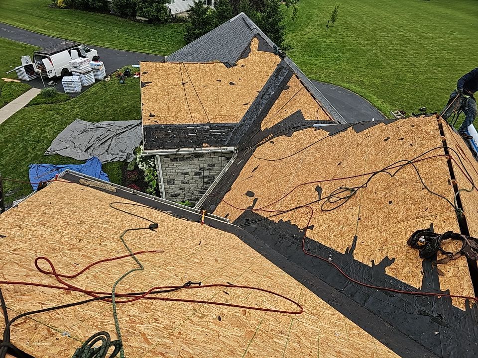 Residential Roofing Installation using Atlas Pinnacle Black Shingles by 614 Exteriors