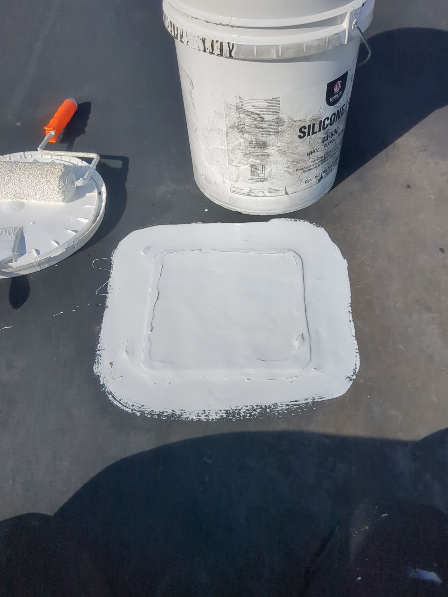 Commercial Roofing Repair using UniFlex Silicone Roof Coating on KinderCare Learning Center by 3 Daughters Construction 
