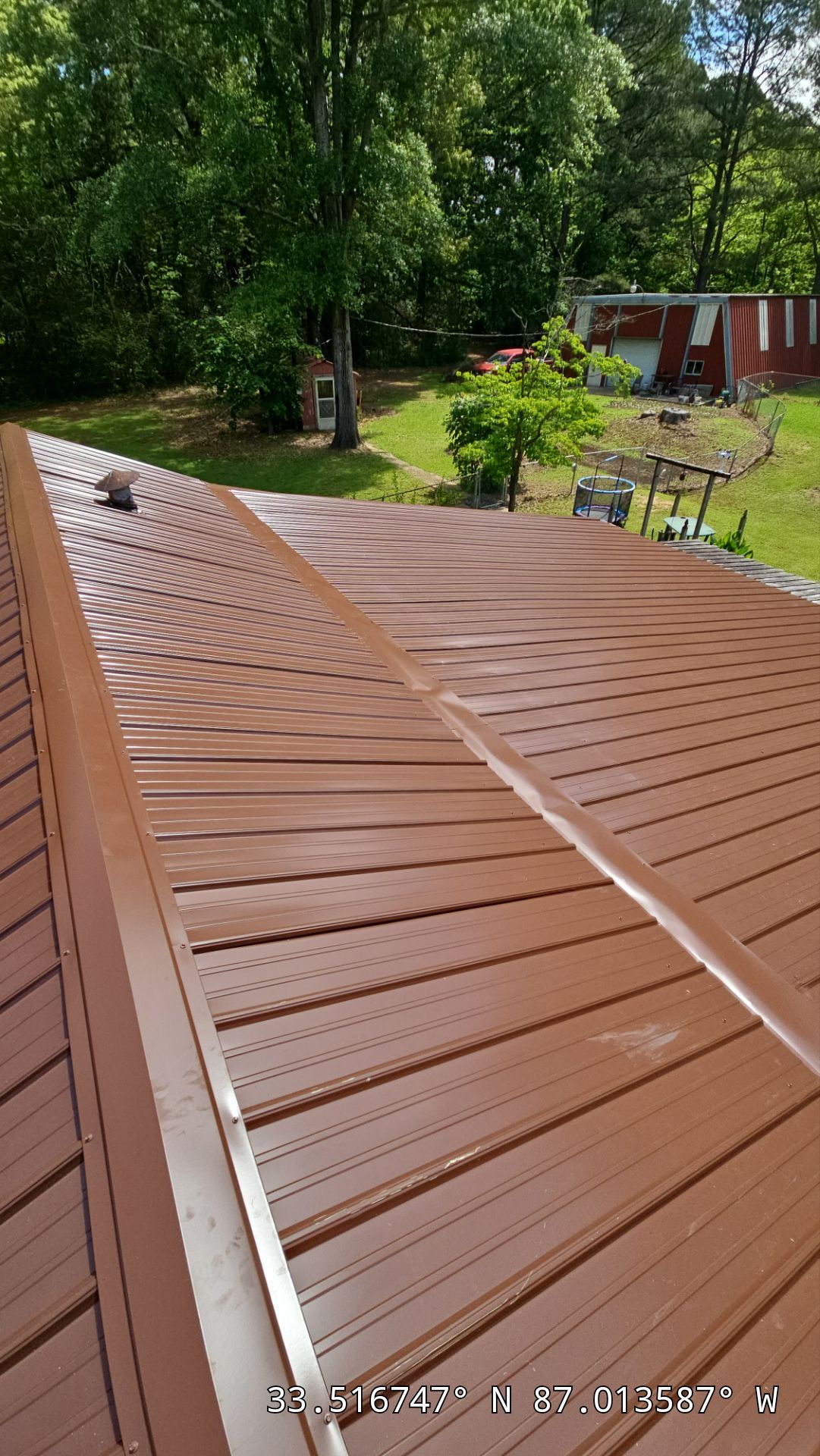 Metal Roof Replacement in Sylvan Springs (Brown) by The Roofing Dudes