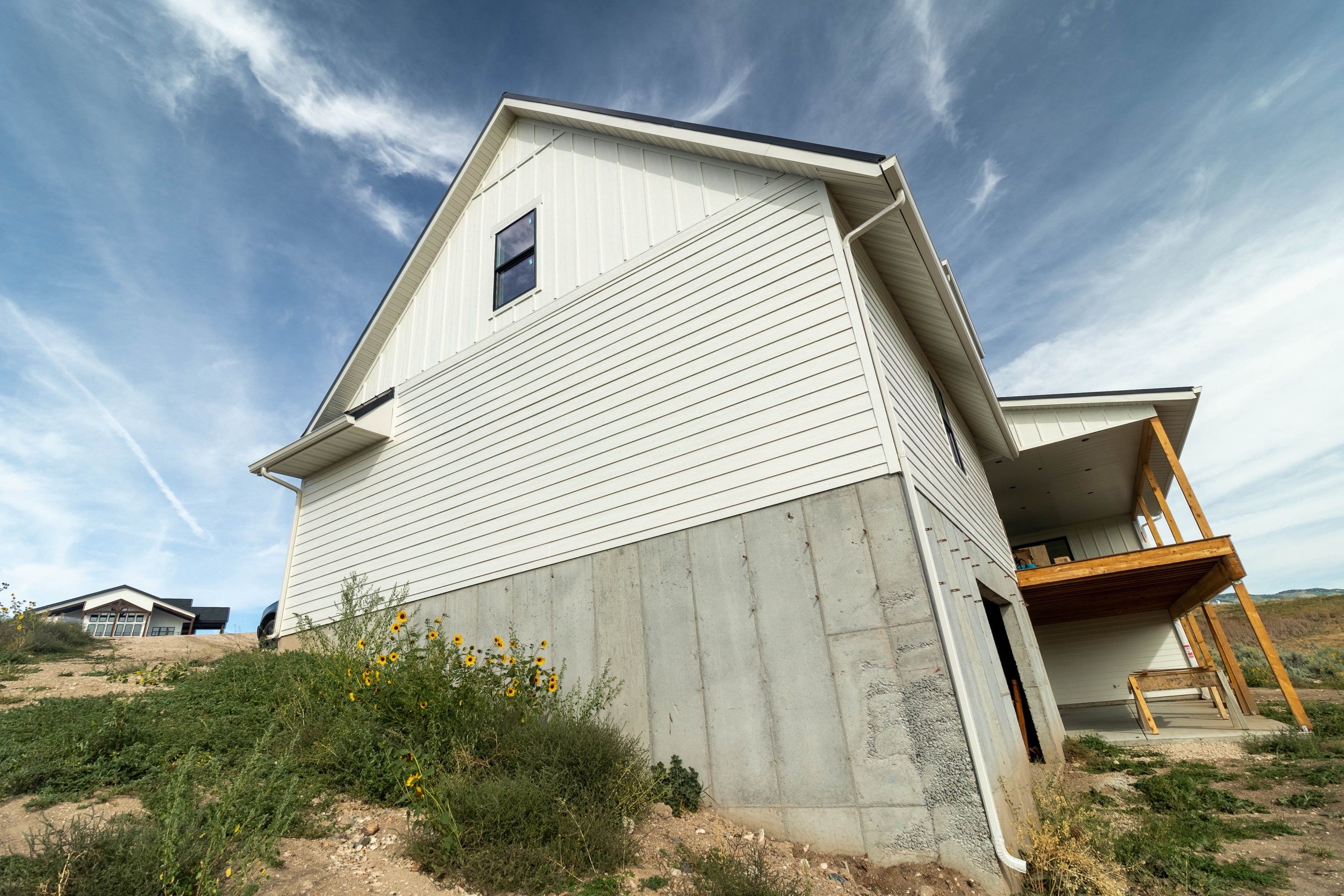 LP SmartSide Siding and Metal Roofing Installation in Garden City by Garner Construction