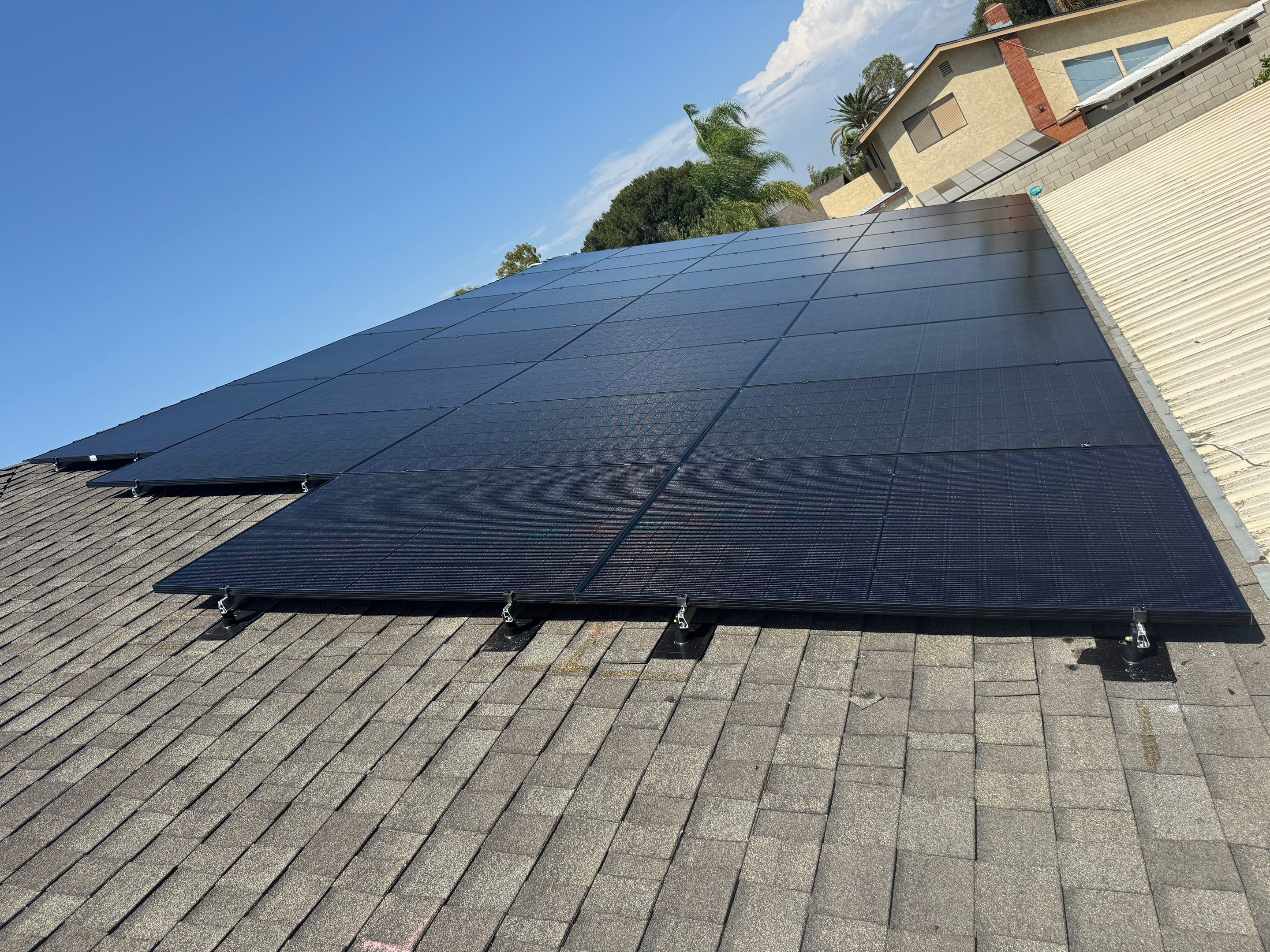 Residential Solar Array and Dual Tesla Powerwall Storage in Corona by VIBE SOLAR