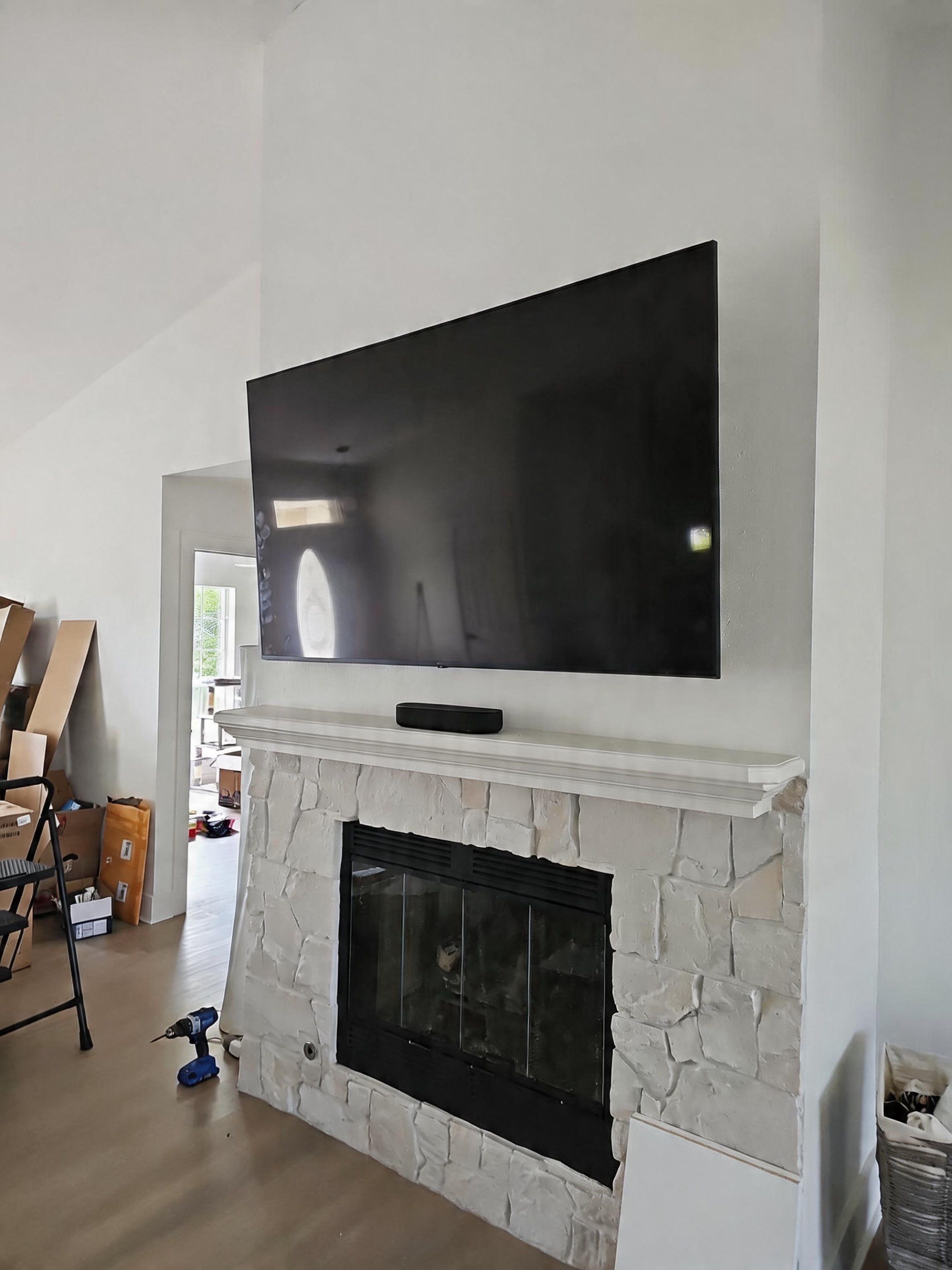Fireplace TV Mounting Projects by Hangman Mounting & Installation 