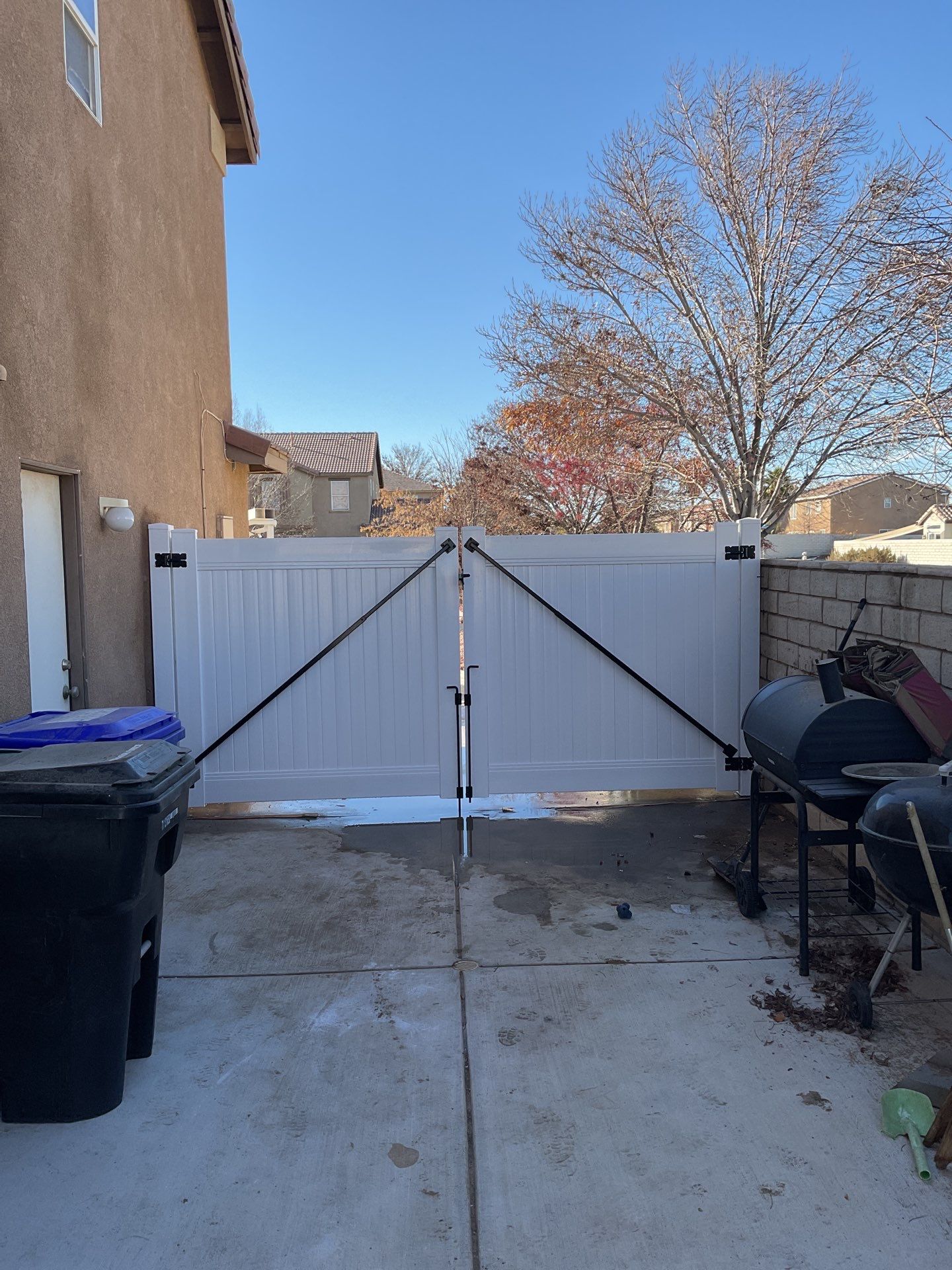 Fence installation using wood by Fence Guys Inc.
