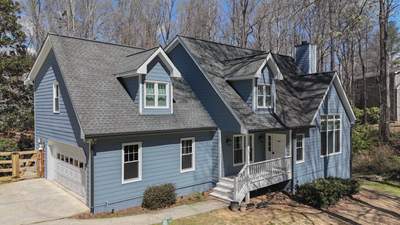 Marietta, GA Full Siding Replacement, 30+ Window Replacements, Screened-In Porch to Sunroom Conversion, Gutter Replacement, and Exterior Painting