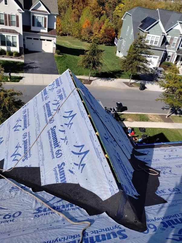 Residential Roofing Installation using Atlas Pinnacle Pristine Black Architectural Shingles by Frederick Roof Repair