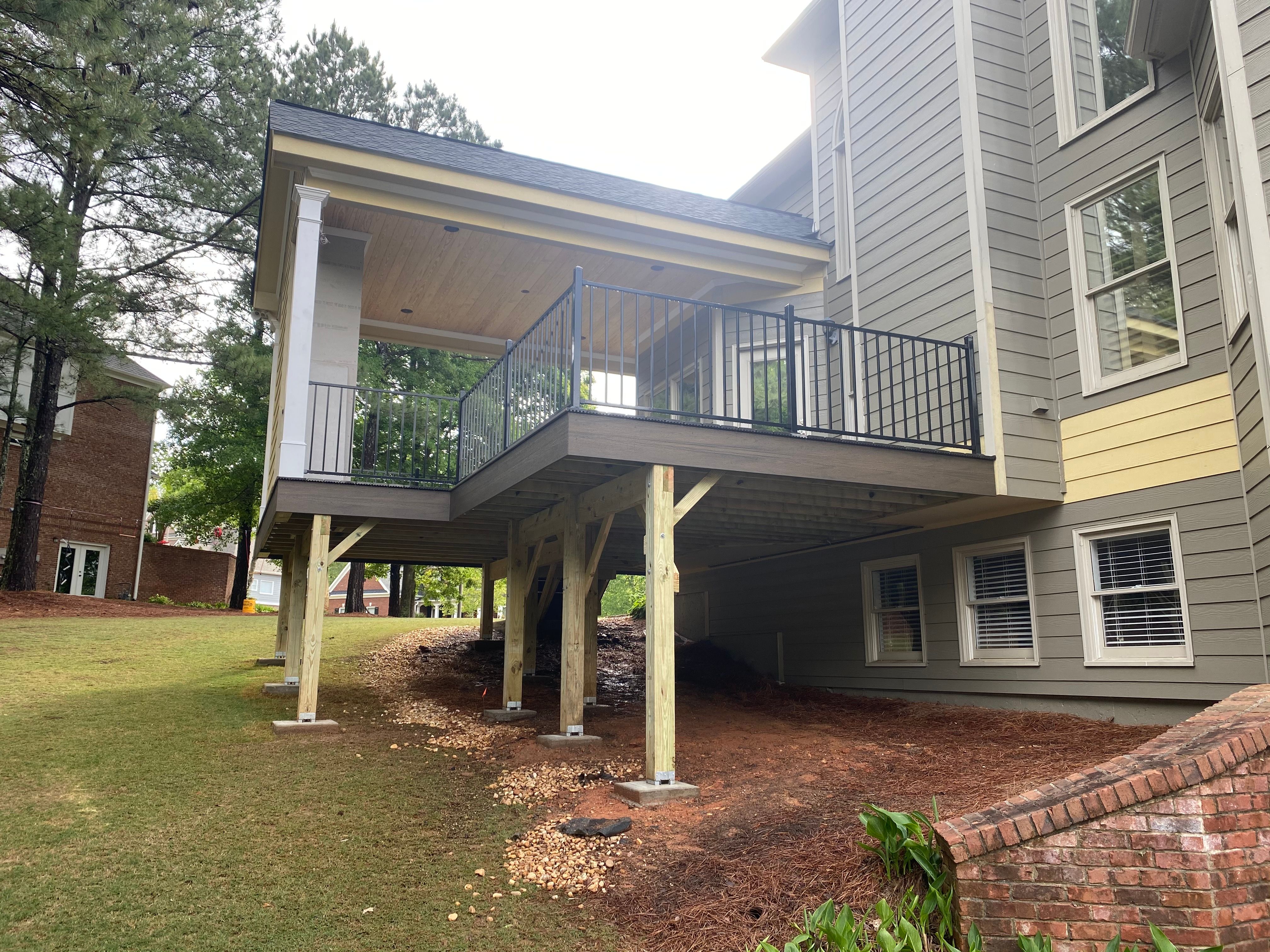 Covered Porch and Composite Deck Addition in Woodstock by Swift Home Renovations