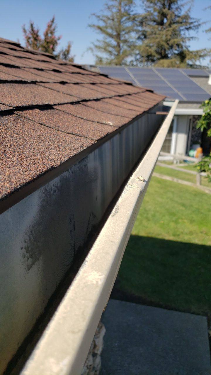 Roofing and Gutters to protect this home by Byers Enterprises