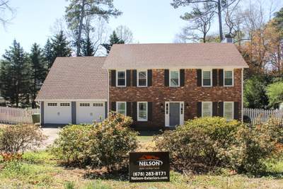 Marietta, GA Siding Replacement, Exterior Paint, Gutter Replacement, and Chimney Cap Installation
