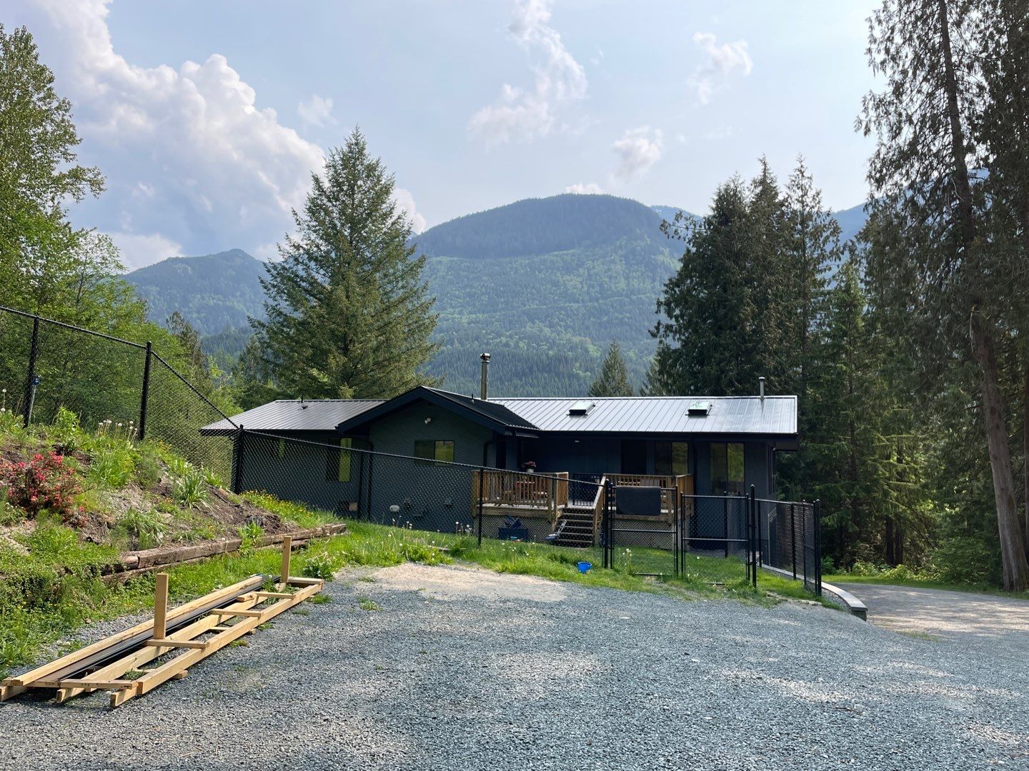 Residential ReRoofing Installation using 12" Prolok metal by Top Notch Roofing Inc