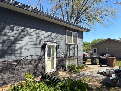 James Hardie Siding and Versetta Stone Exterior Renovation in Bellevue
