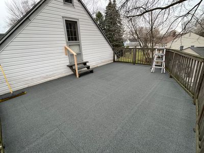 Residential Roofing Installation using Certainteed Flintastic Rolled Roofing