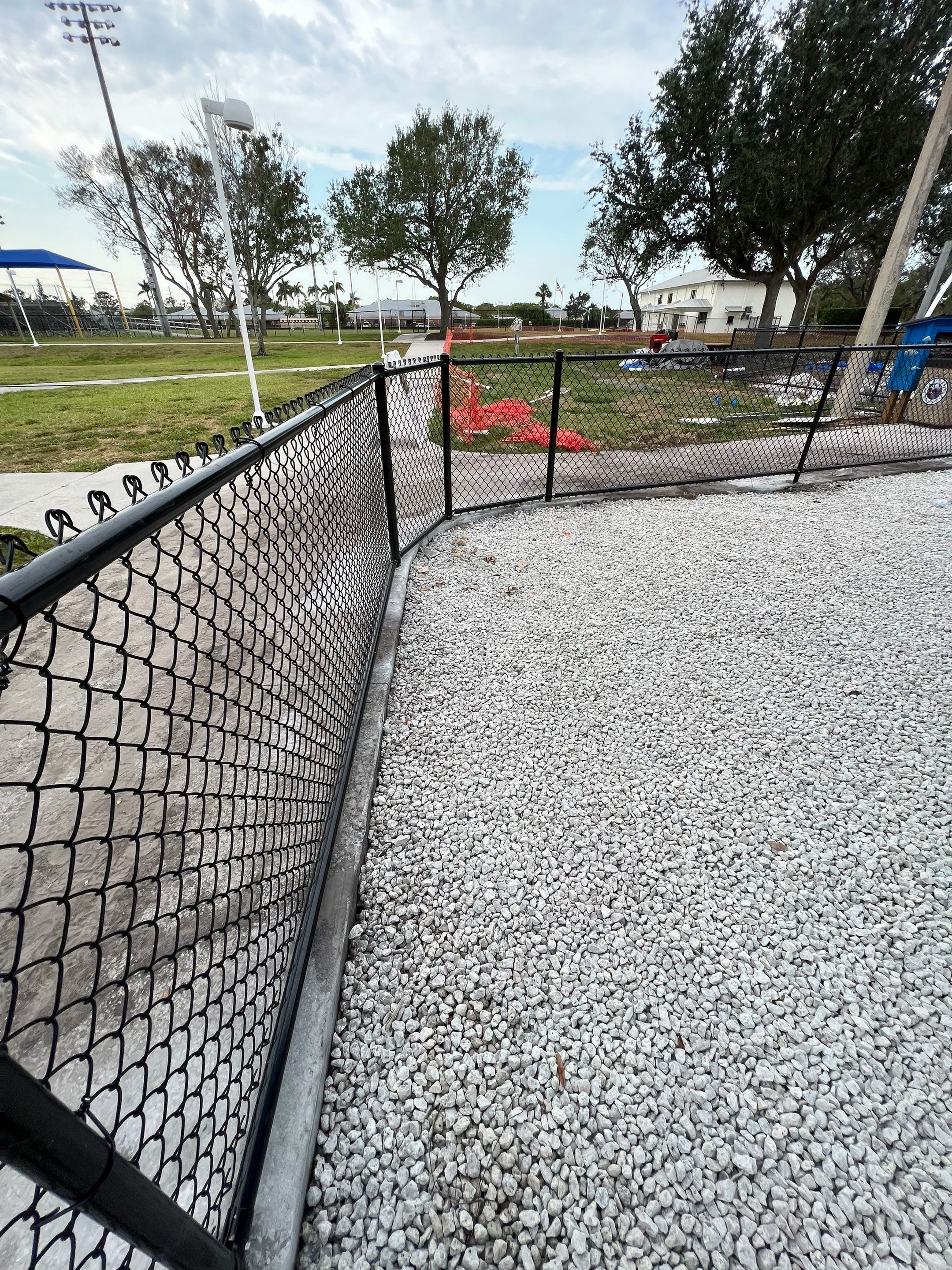 Vinyl Coated Chain-link fence for the City of Naples around Fleischmann Park Playground.  by Asap fence and gates, LLC