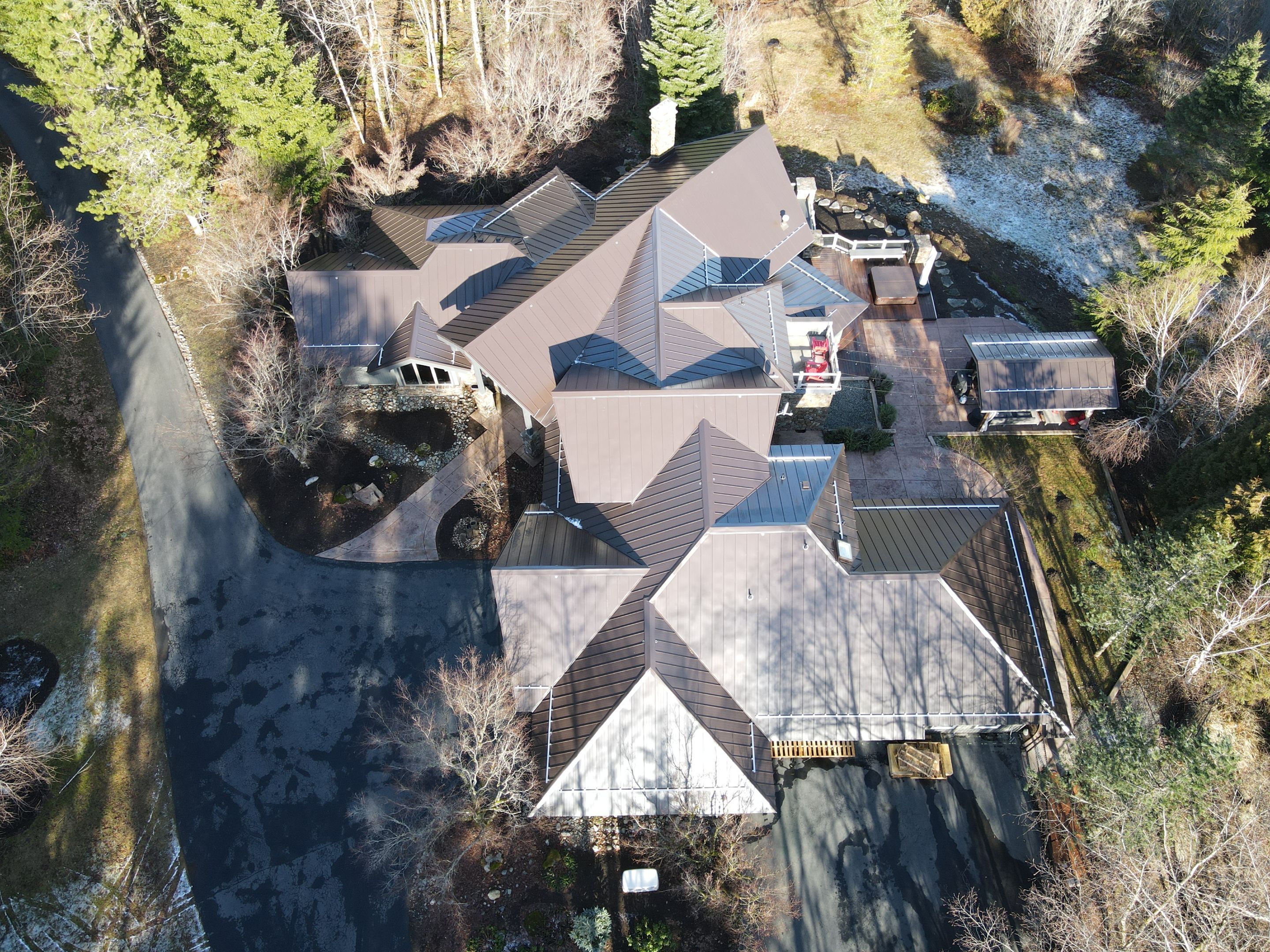 North Bend Roof Replacement using Standing Seam Metal - Dark Bronze by RoofSmart