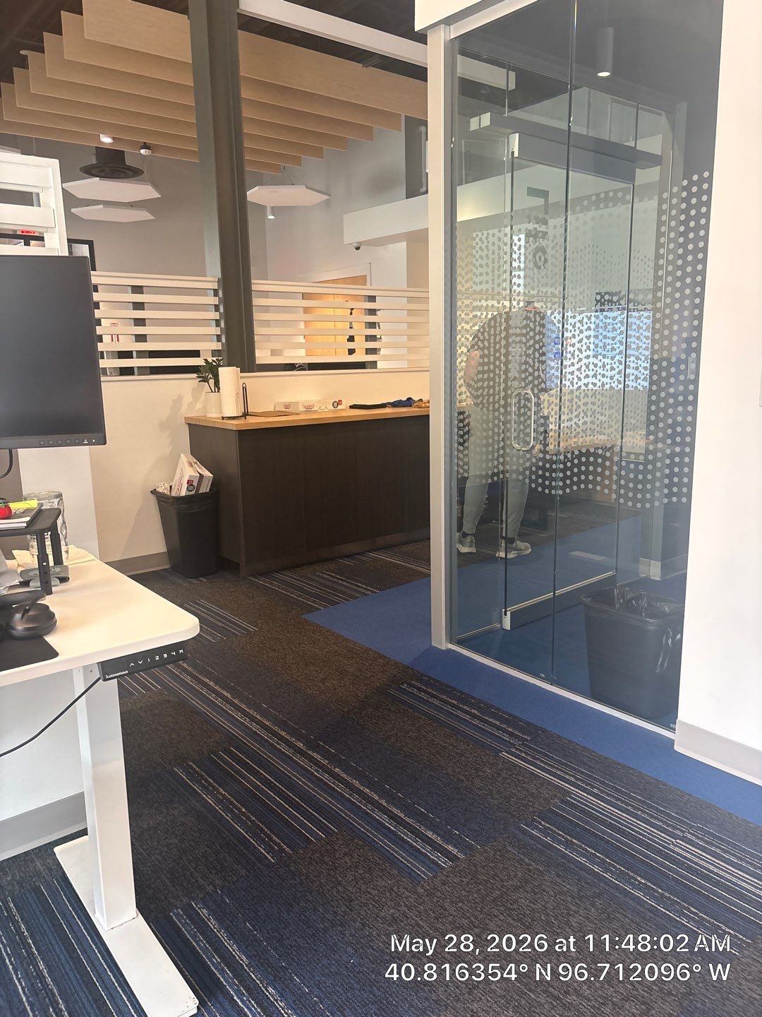 Modern Office Remodel with Acoustic Baffles and Glass Partitions by CompanyCam Sales Demo