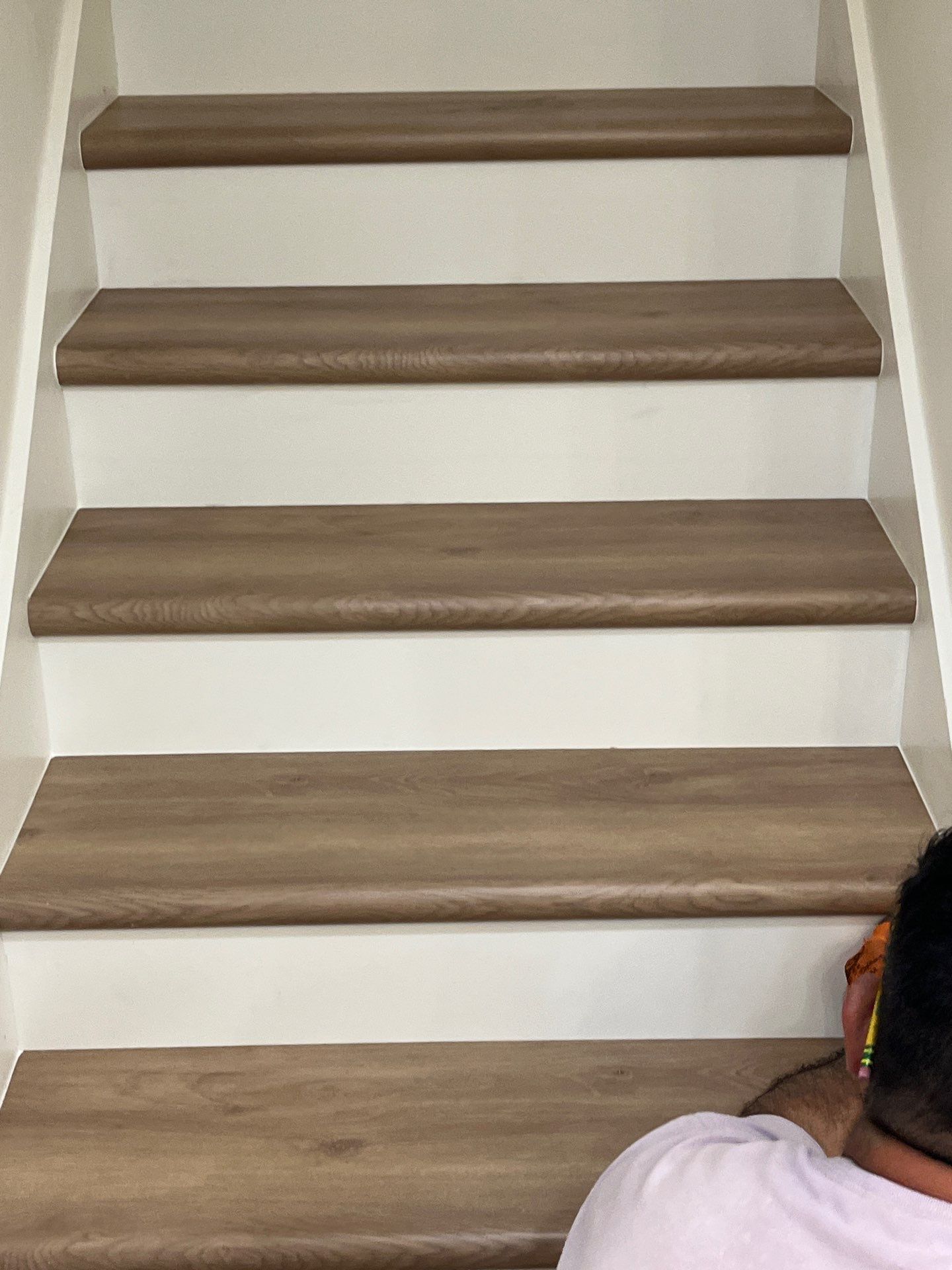 LVP stair upgrade by Vrmmm Flooring