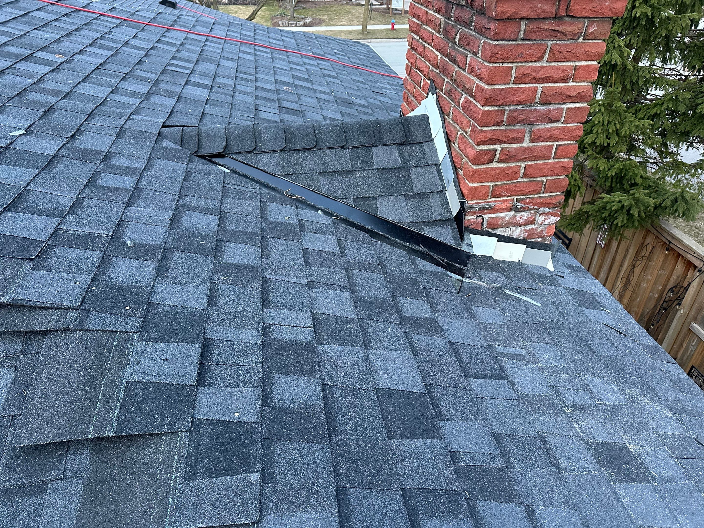 Project in Burlington by The Roofing Crew