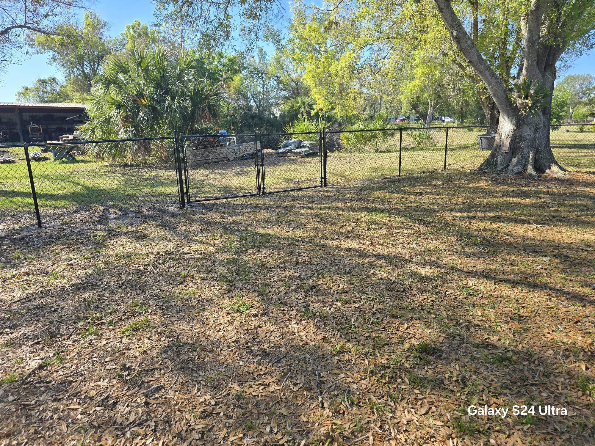 Black Chain Link Fence Installation in Port Charlotte by True Fence LLC
