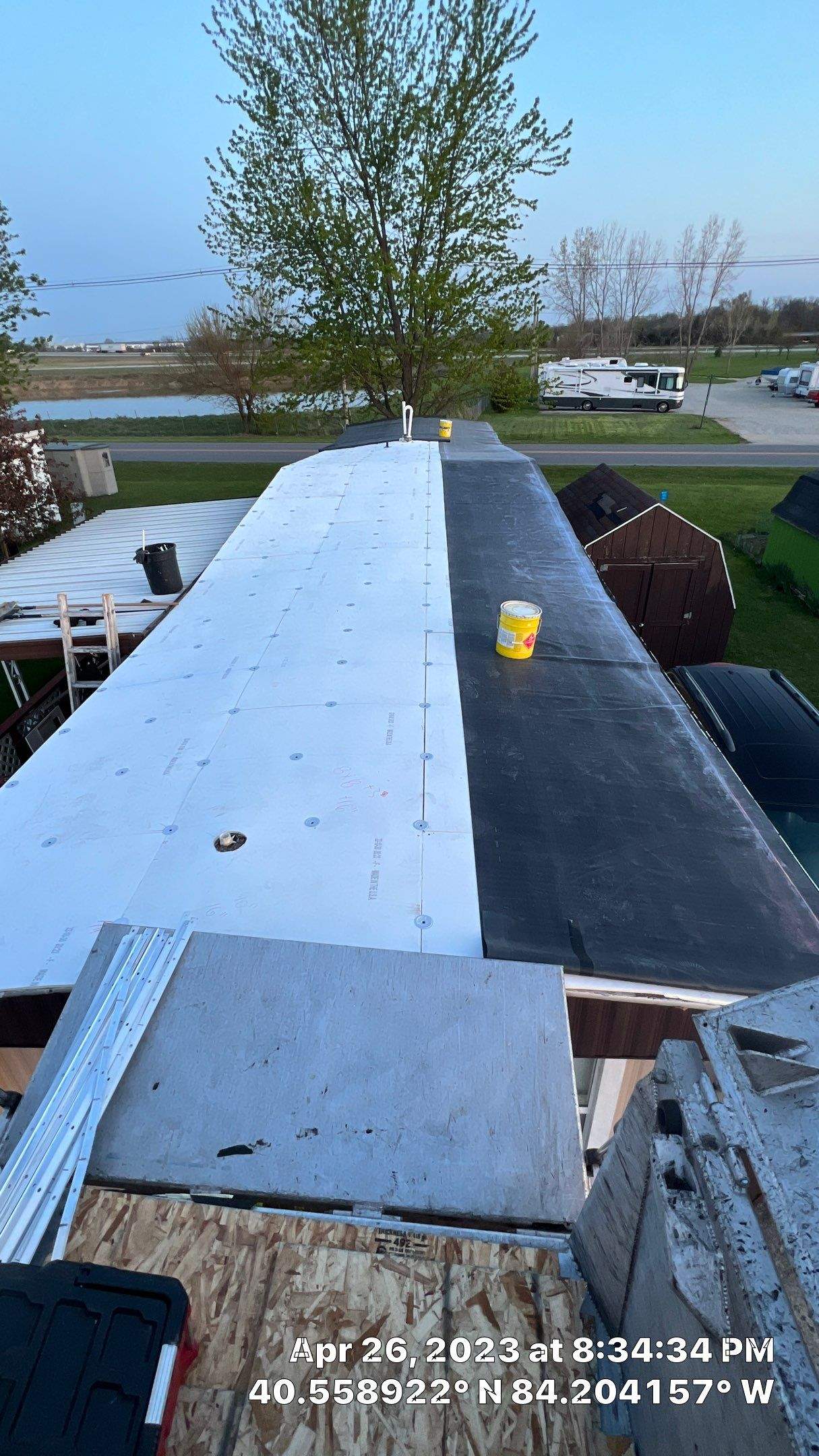 Residential Roofing Installation using 60 mil rubber roof  by Nitro Roofing and Construction
