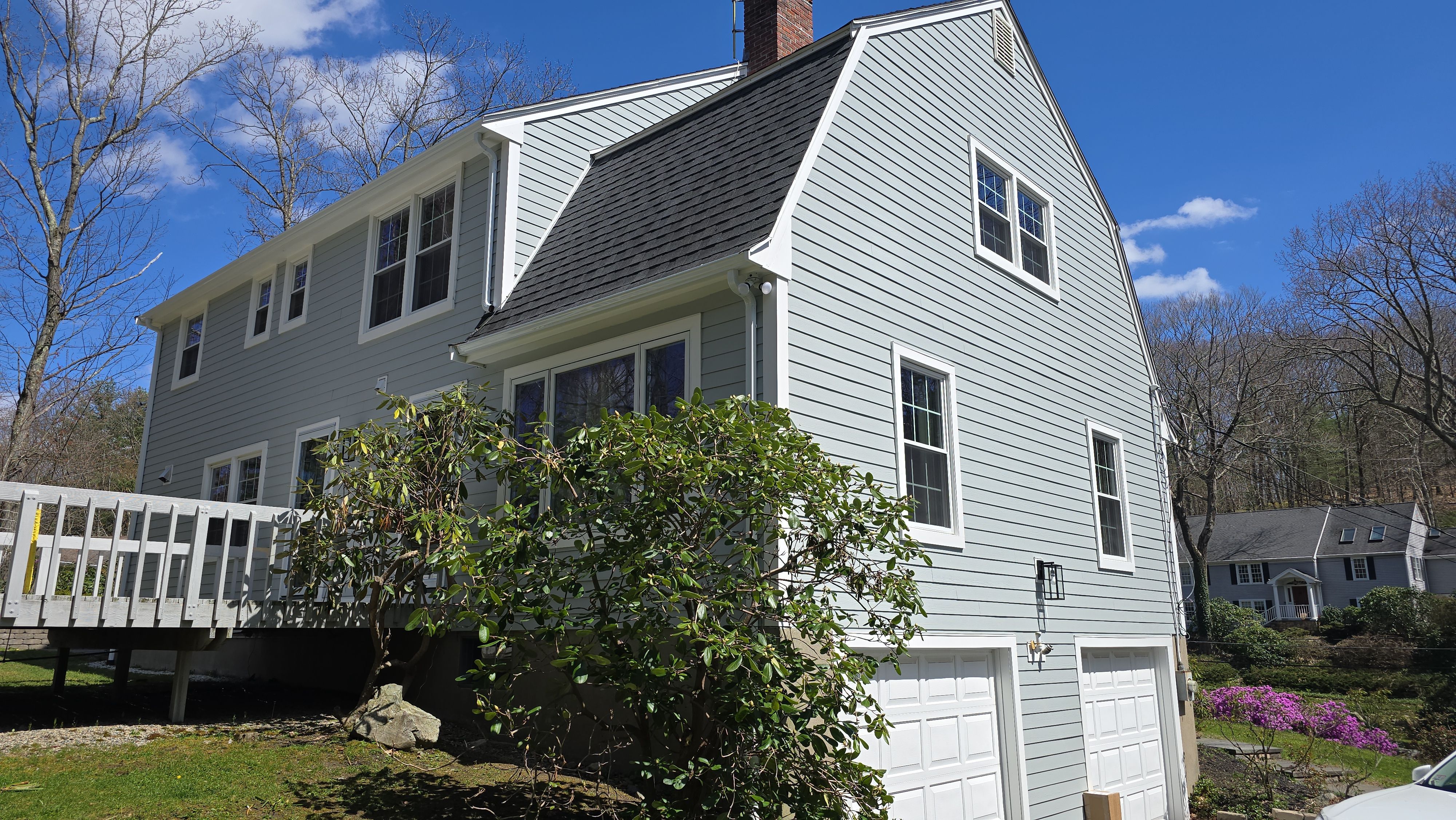 Custom window trim work and siding replacement in Dover, MA by UBrothers Construction