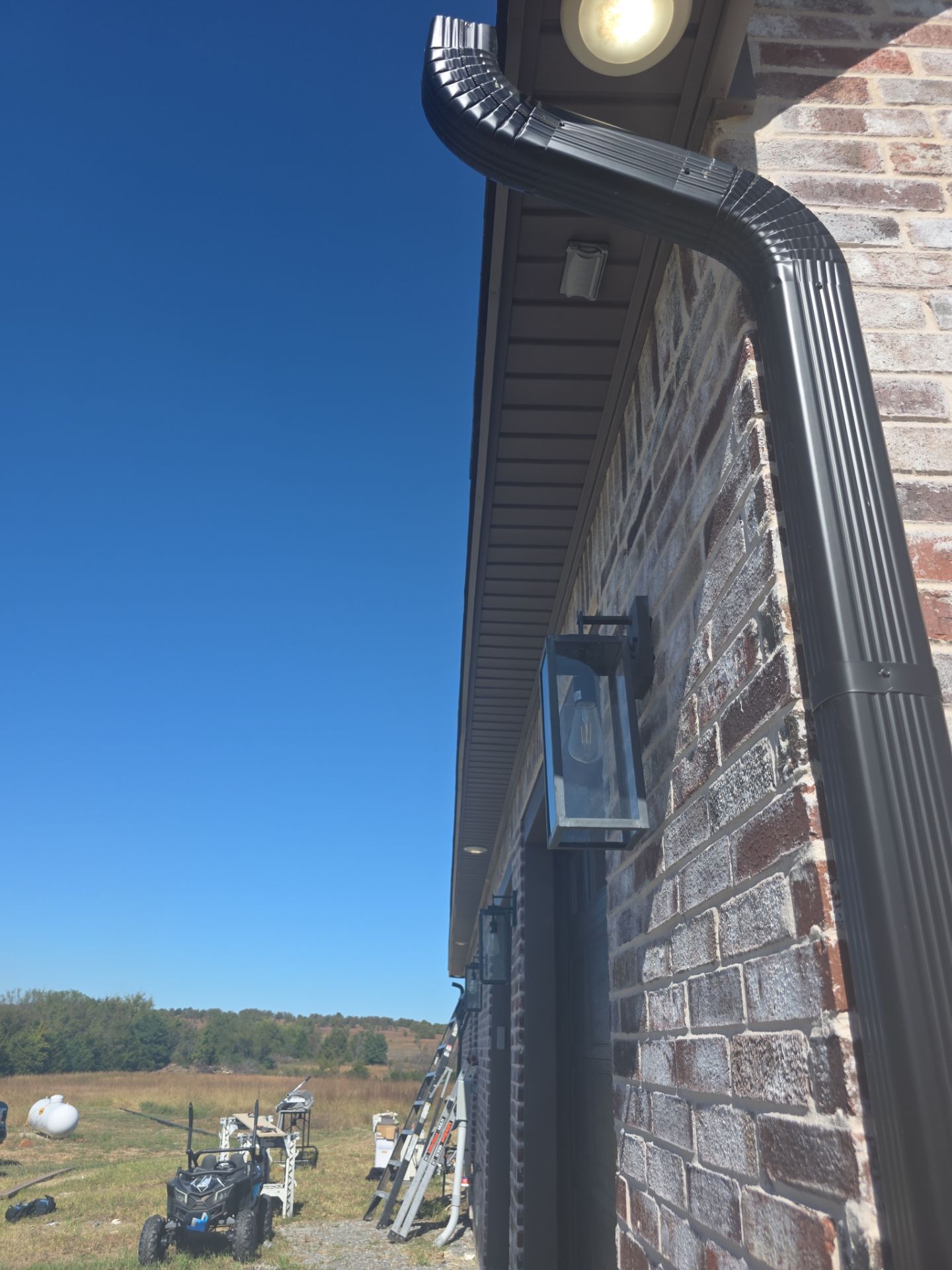 Fascia and door frames wrapped with PVC coil & soffit installation by In & Out Construction & Remodeling, LLC