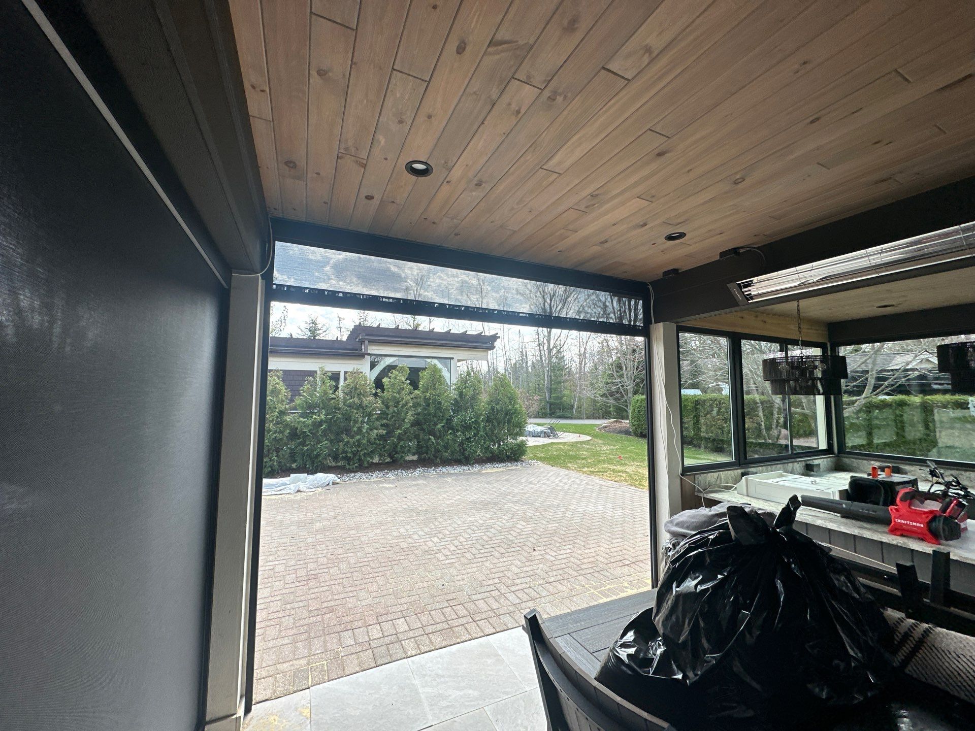 Sunesta Retractable Screen and Gutter Protection in Petoskey by Rainbow Seamless Systems