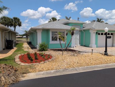 Front Yard Renovation – Rock Removal, Sod & Landscape Enhancement