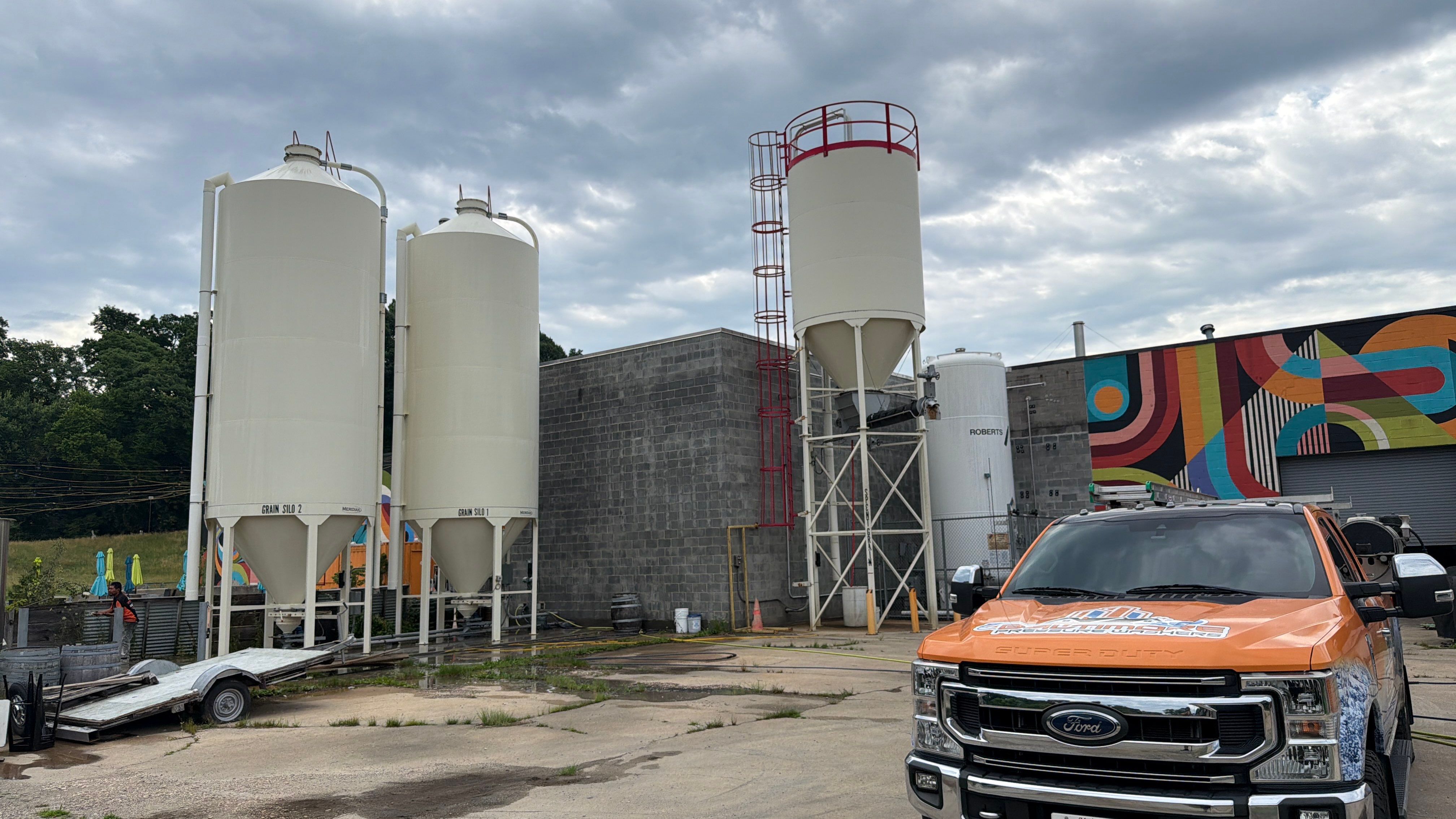 Industrial Storage Silo and Exterior Building Washing in Baltimore by Baltimore Pressure Washers Inc.