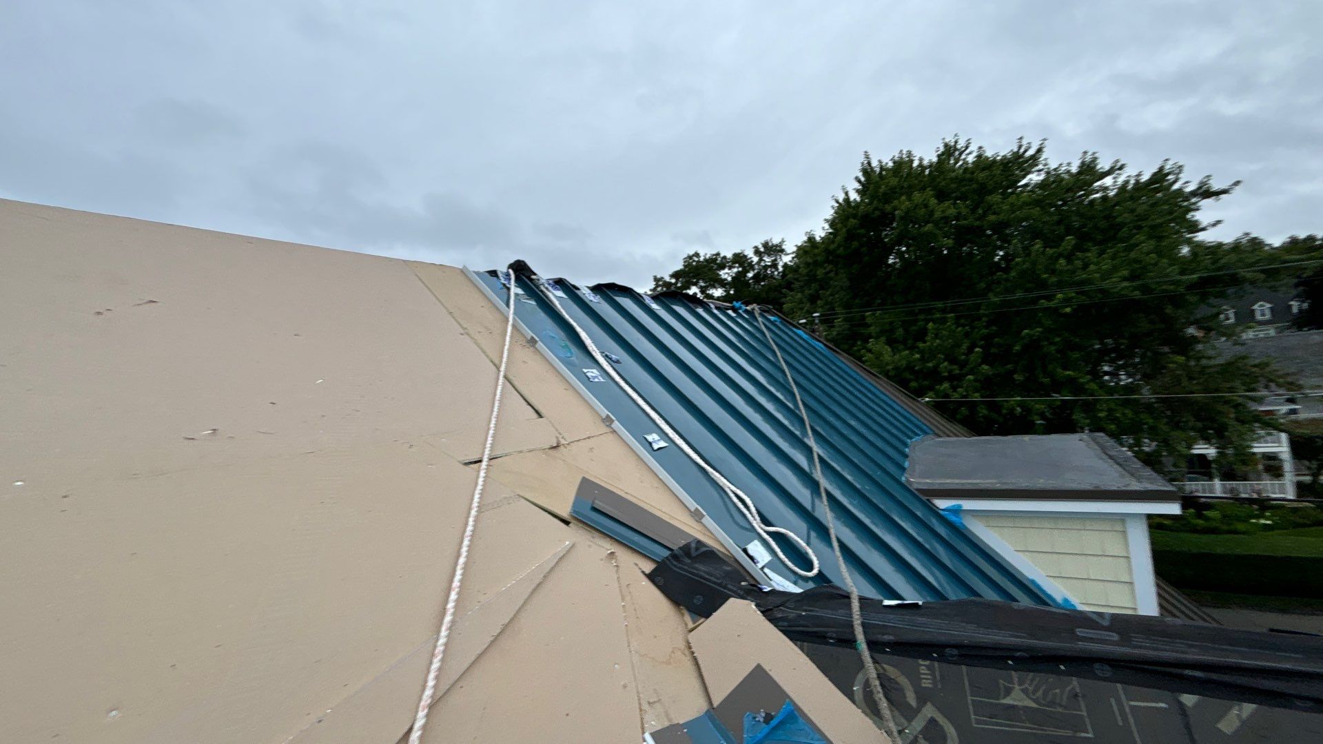 Standing Seam Aluminum Roof Installation by Lecla Home Improvements and Roofing INC