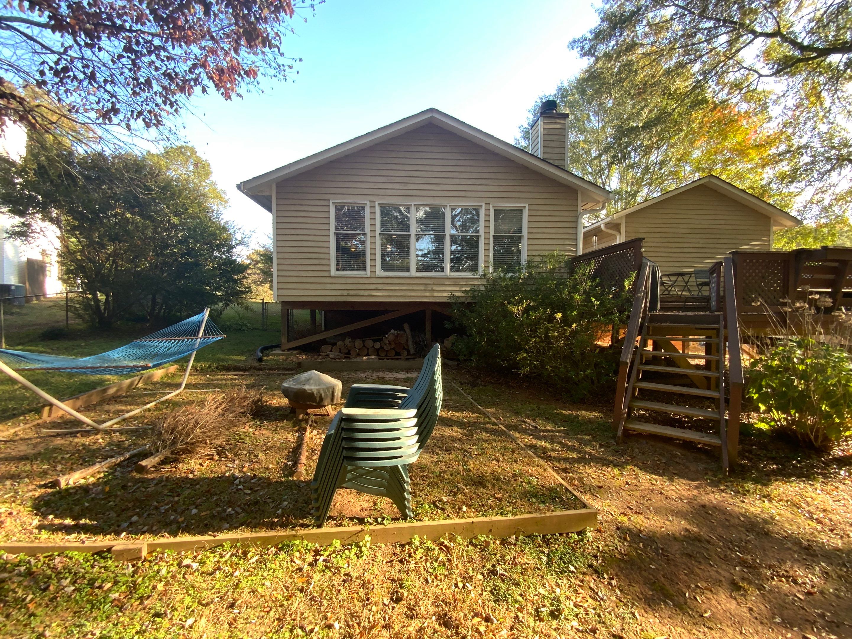 Elevated Pressure-Treated Wood Deck Extension in Marietta by Swift Home Renovations