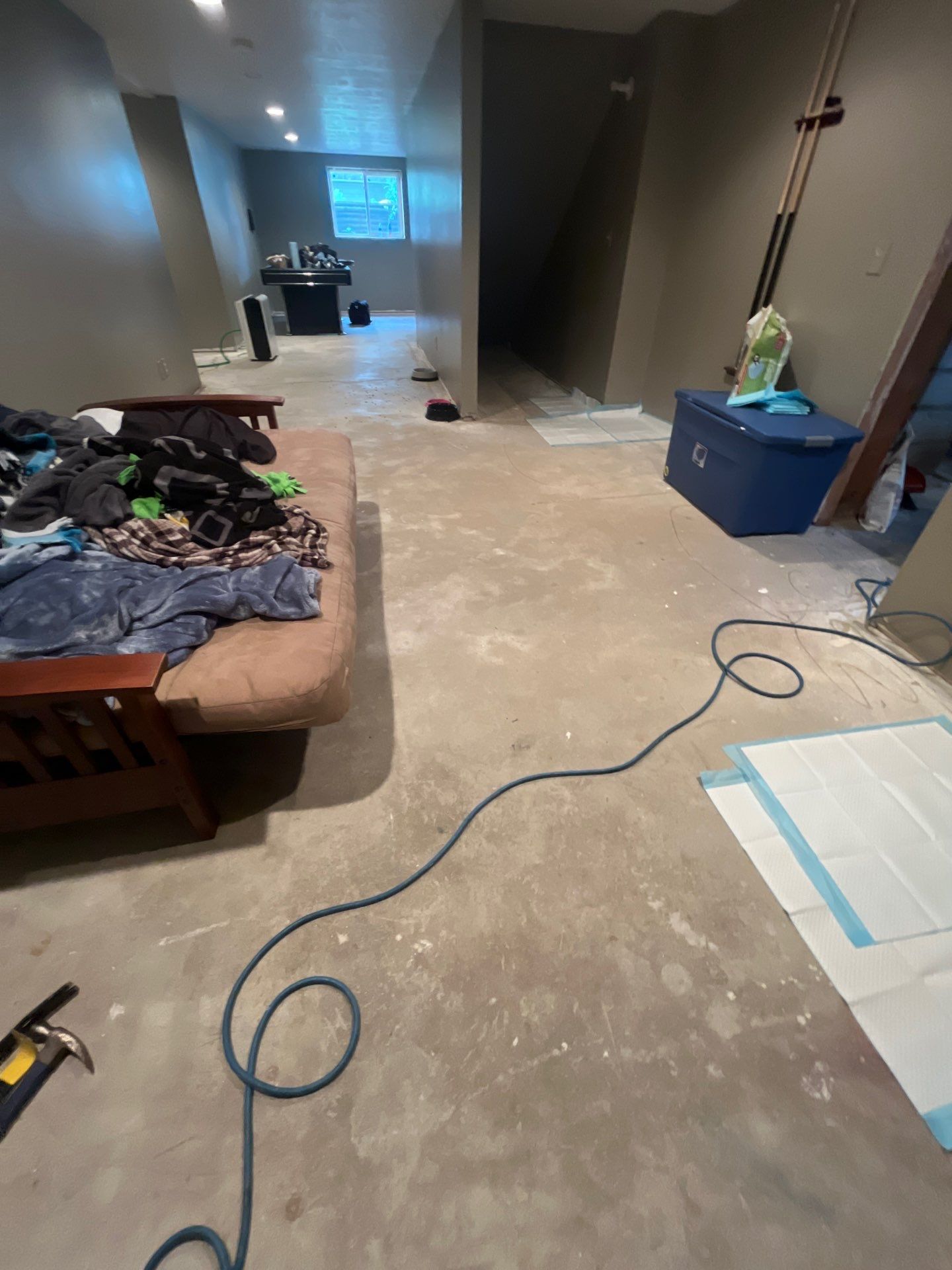 Custom Multi-Fleck Epoxy Floor Coating for Residential Basement by Select Painting, Coatings & Garage Cabinets