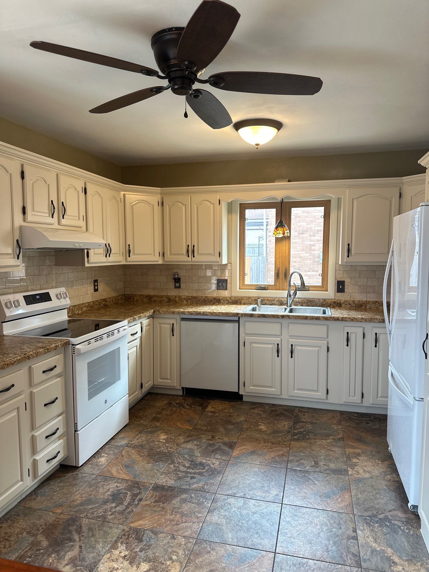 Kitchen Cabiner/Drawers Repaint by OCS Contracting Services