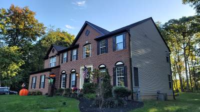 Gutter Installation using Black Gutters, soffit & fascia