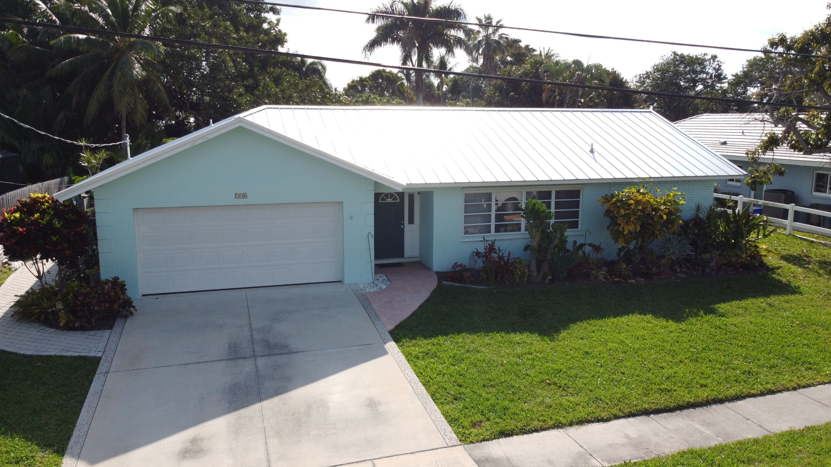 Residential Roofing Installation using 1" Nail strip metal roof by BLUES BROTHERS ROOFING