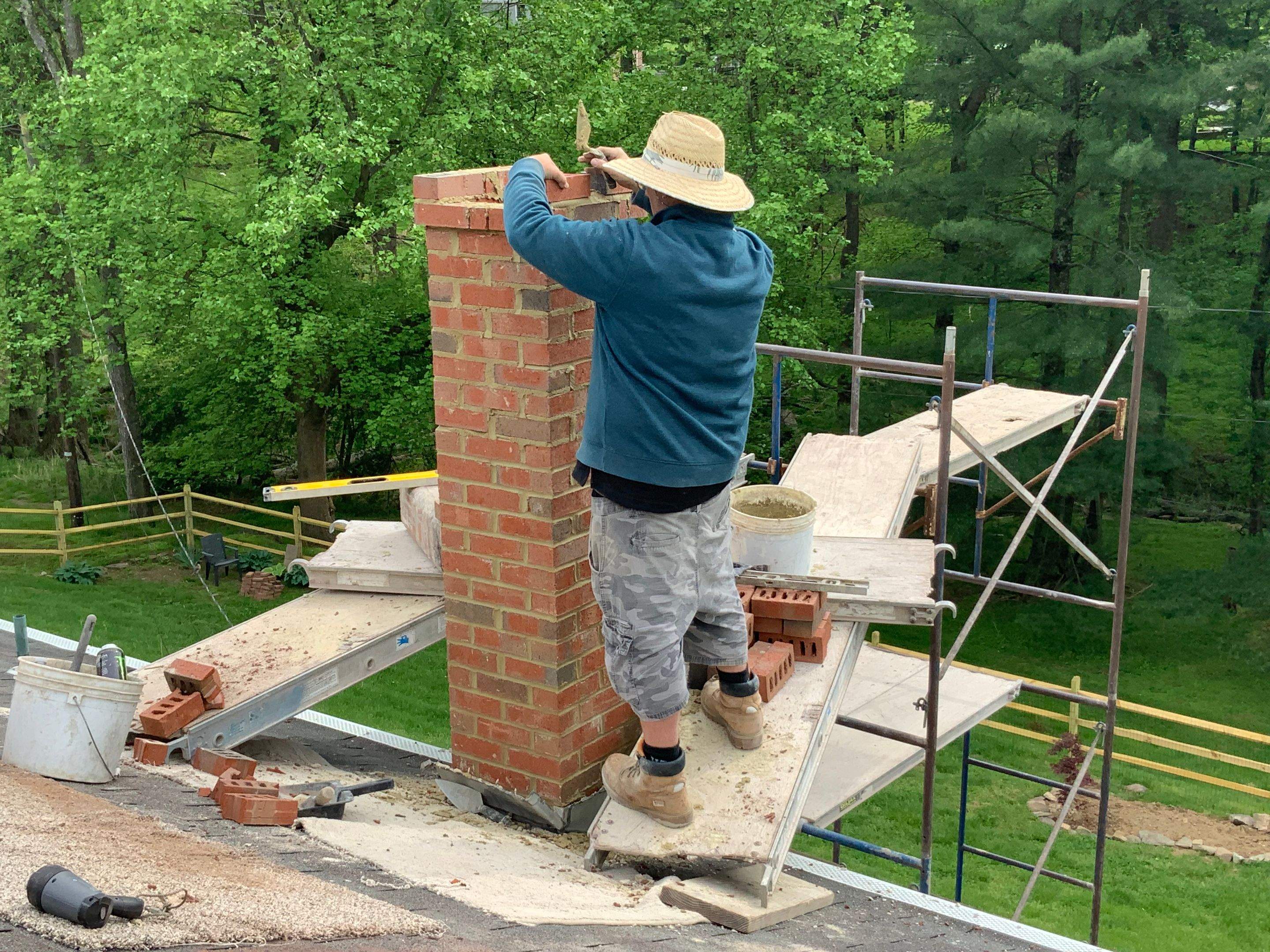Residential Roofing Installation using Landmark Shingles Color Weatherwood by Alpha Design Services