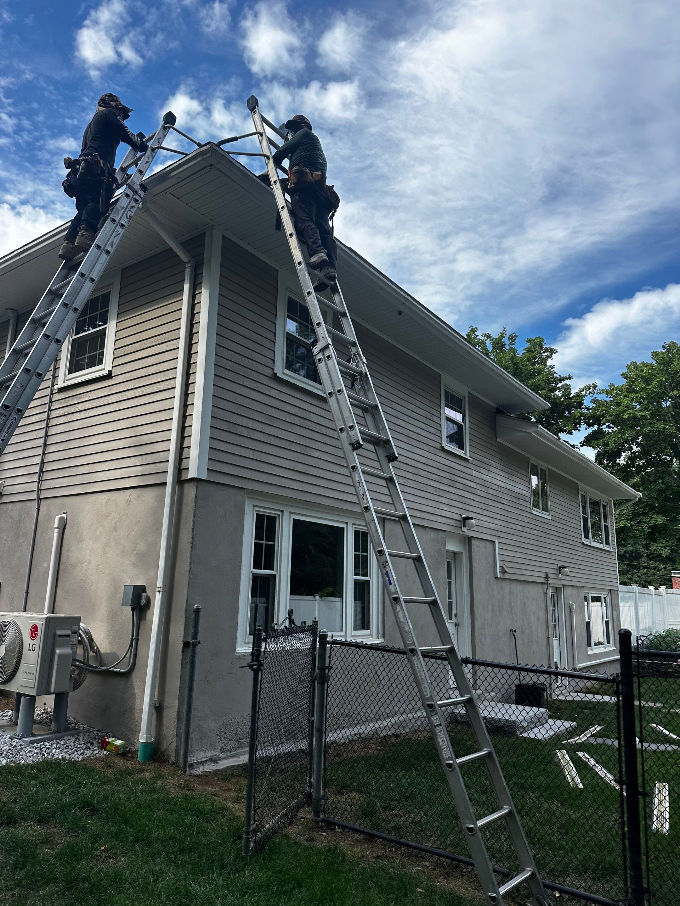 Roof Repair & Fascia Trim Work in Lowell, MA by Mighty Dog Roofing of Greater Middlesex County