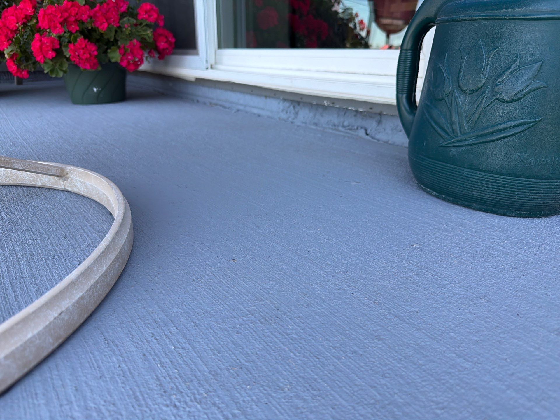 Starry Evening Concrete Patio Coating Installation in Tea by Select Painting, Coatings & Garage Cabinets