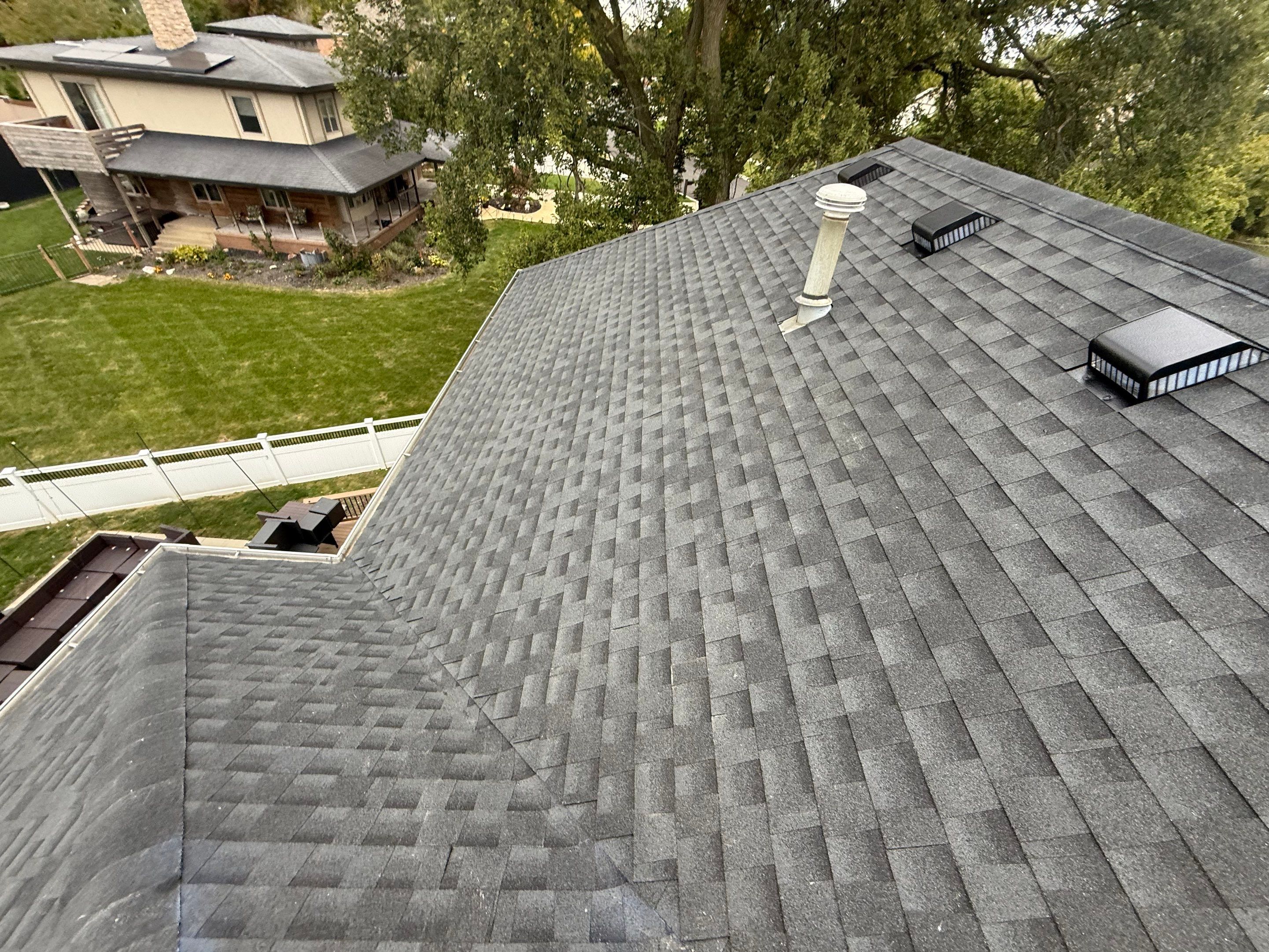 Roof and windows by Optimal Home Improvement 