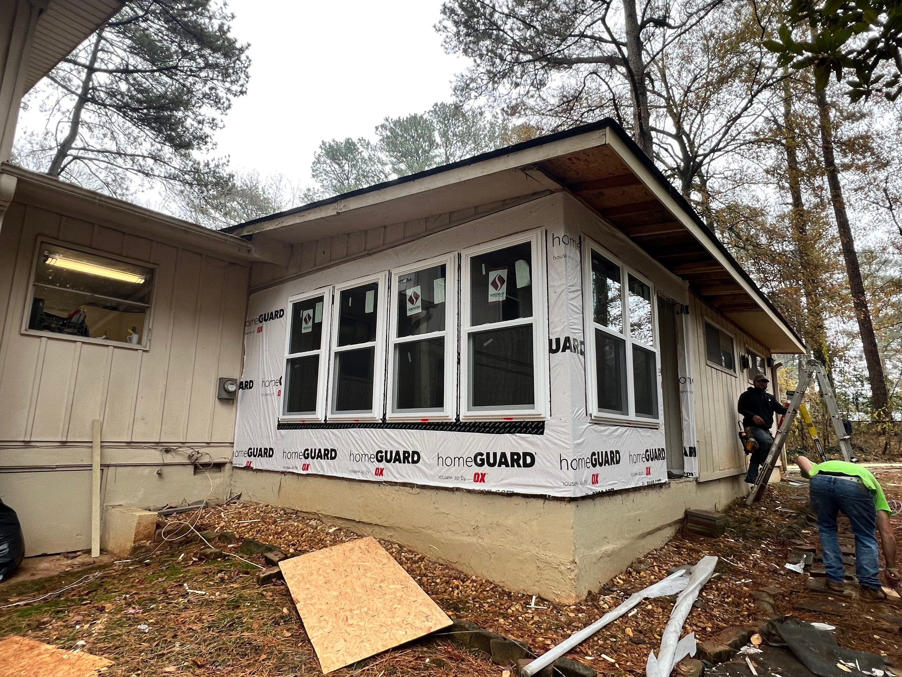 Sunroom Conversion and Pressure Treated Deck Installation in Doraville by Swift Home Renovations