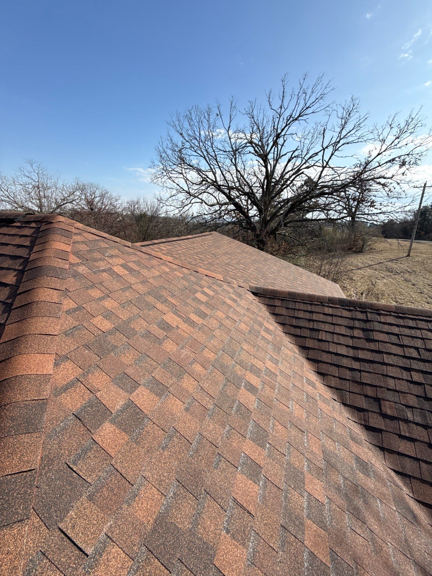 Rustic Hickory Shingles & SBS Cap & Base by In & Out Construction & Remodeling, LLC